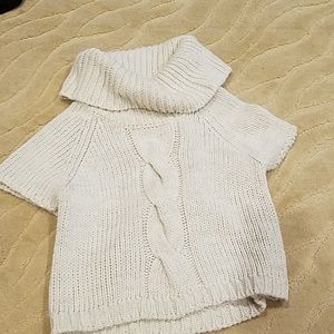 The Limited Cream Short Sleeve Turtleneck.